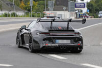 5 Porsche 5 Gt5 Rs Spied With Larger Hood Scoops And 2023 Porsche 911 Gt3