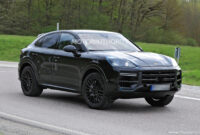 5 porsche cayenne coupe spy shots and video: major changes porsche cayenne blacked out