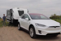 tesla model x with camper: family’s first official towing test model x towing capacity