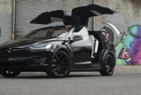 tesla’s silly falcon wing doors have one great function tesla butterfly doors price